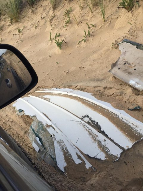 fibreglass hull remains, buffalo beach,